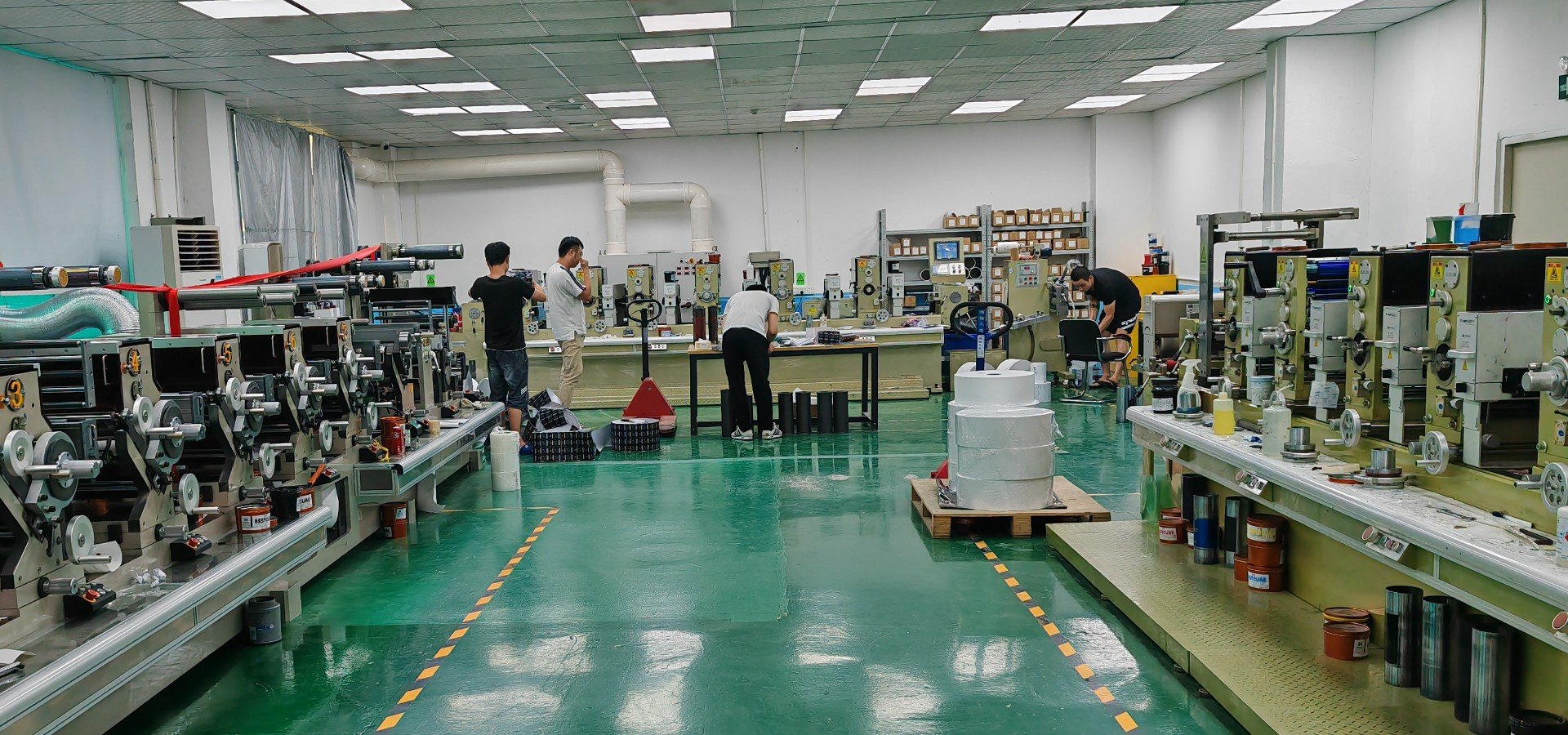 Kayu Packaging label printing factory floor - in-house roll label production lines